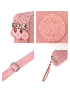 Dettagli della borsa porta cellulare in nylon rosa con scomparti a zip e tracolla
