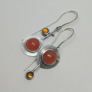 Vintage bohemian drop earrings featuring red round stones and retro silver hooks