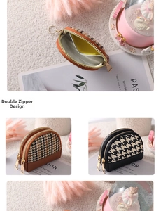 Detail of dual zipper canvas coin purse featuring houndstooth pattern and metal keychain