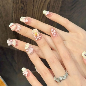 3D cartoon bear and bunny press-on nails in pink and green with glossy 3D art