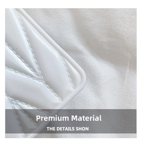 Close-up detail of white quilted glossy leather with professional stitching on a kids purse