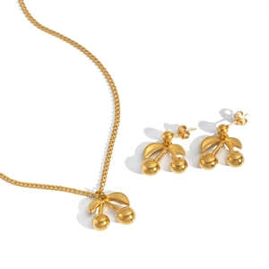 Exquisite 18K gold cherry jewelry set featuring a pendant necklace and stud earrings