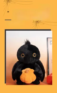 Close-up of a plush black crow holding a pumpkin with Halloween festive details