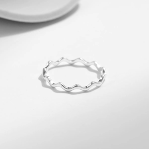 Minimalist S925 sterling silver wave ring with a polished finish on white background