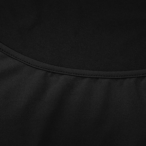 Close-up of high-elastic black knitted fabric showing premium stitching and smooth texture
