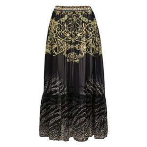 Close-up of baroque gold patterns and leopard print on maxi skirt with beaded waist