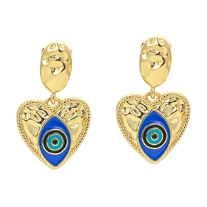 Detail of 18K gold-plated heart earrings with blue and black evil eye enamel inlay