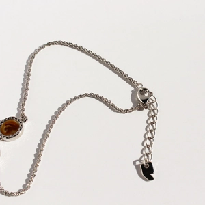 Minimalist silver twist chain long necklace with brown amber texture round pendant