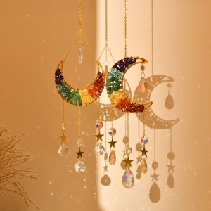 Detail of moon suncatcher with rainbow amethyst crystals and sparkling prisms