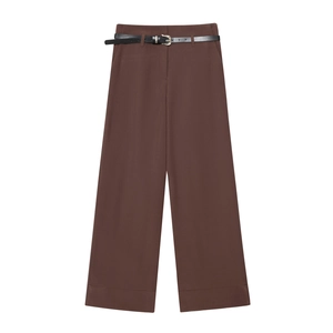 Women's brown wide-leg trousers with black belt and cuffed hems on white background