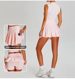 Detail view of pink tennis skirt featuring a hidden side pocket on the inner shorts layer
