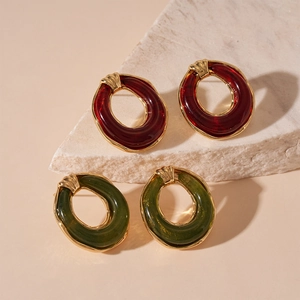 Retro resin geometric round stud earrings in red and green with gold metal accents