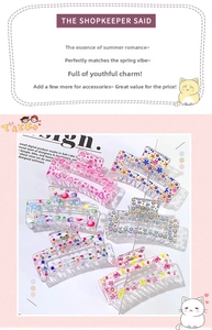 Detail view of 6-piece clear acrylic hair claw clips featuring floral and heart patterns