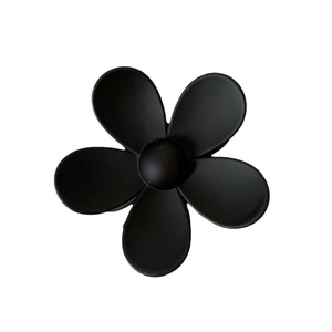 Elegant matte black flower hair claw clip with a minimalist five-petal floral design