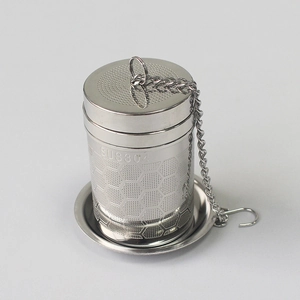 Detailed view of SUS304 stainless steel tea infuser with mesh and chain on holder