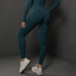 Détail du legging de yoga sans couture taille haute avec effet push-up en couleur sarcelle