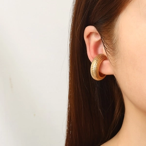 Chic 18K gold plated snake texture ear cuff earring shown on model with close-up view