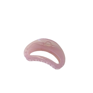 Pink translucent semi-circular claw clip with minimalist design for everyday hair styling