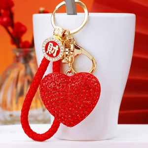 Red rhinestone heart keychain with gold Cai character and braided loop for car keys