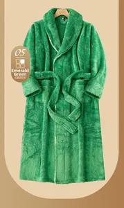 Close-up of thick emerald green plush bathrobe showing warm flannel fabric and shawl collar