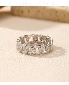 Macro detail of S925 silver Cuban link ring featuring pavé-set shimmering zircon stones