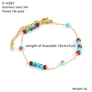 Detail view of colorful beads and 18k gold-plated 304 stainless steel chain bracelet