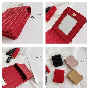 Mini portable makeup case with mirror showing interior detail and multiple colors
