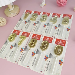 Set of 10 golden number candles 0-9 for birthday cake toppers in retail packaging