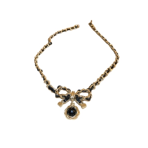 Dark style bow flower faux leather wrapped necklace with gold metal chain for women