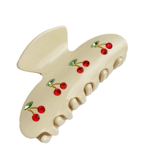 Creamy acetate claw clip with red cherry rhinestone patterns for a pastoral style look