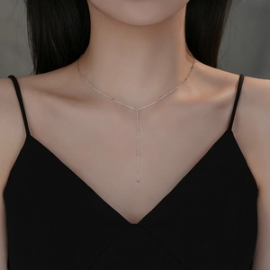 Elegant S925 sterling silver tassel Y-shaped necklace shown on a model with small beads