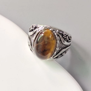 Vintage men's silver ring with oval yellow tiger eye stone and engraved vine patterns