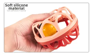 Detail showing soft flexible material of the Manhattan ball rattle toy for infants