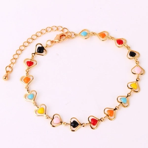 Detail of gold heart chain bracelet with colorful enamel links and lobster clasp