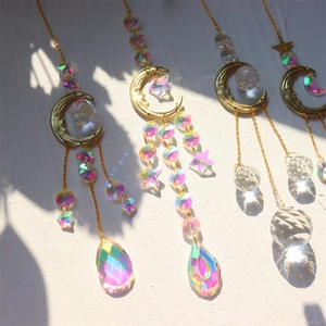 Golden moon and star crystal suncatchers with rainbow beads for garden decoration