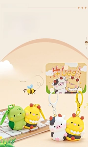 Detail of magnetic cartoon animal keychains with cute bee and cow silicone charms