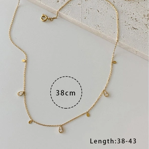 Elegant gold fringe necklace with cubic zirconia drops and 38-43cm adjustable chain