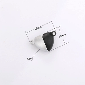Macro detail of heart-shaped alloy magnetic clasps in silver and black with dimensions