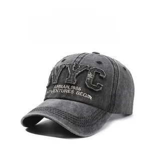Close-up of deep grey washed cotton baseball cap with NYC embroidery and vintage details
