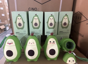 Macro shot of 280ml avocado-shaped portable water bottle with cute cartoon expression