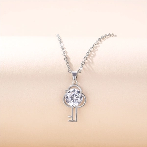Elegant silver titanium steel key necklace featuring a sparkling round zircon pendant