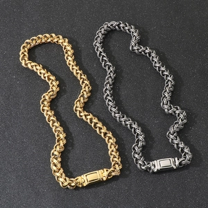 Detail of twisted cable chain necklaces in gold and silver finish with magnetic clasps