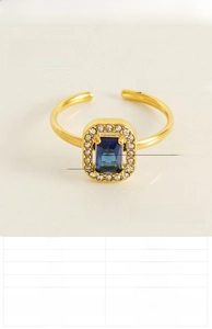 Détails des dimensions du zircon bleu et paramètres de la bague en acier plaqué or 18K
