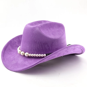 Detailed view of purple suede cowboy hat with white pearl decorative band and wide brim
