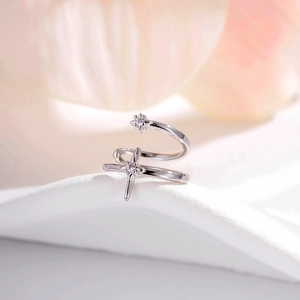 Minimalist silver double-layered open ring with starburst motifs and zircon inlays