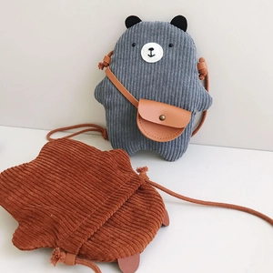 Detail of cute bear crossbody bag for kids in grey and brown corduroy material