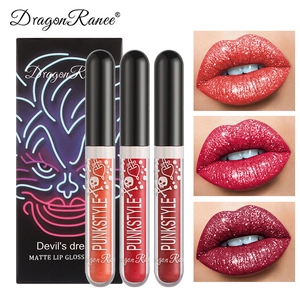 Punk style matte lip gloss set with three bold colors including orange and dark red