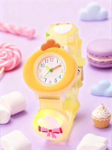 Close-up of kids cartoon chick watch with colorful numbers on dial and soft silicone strap