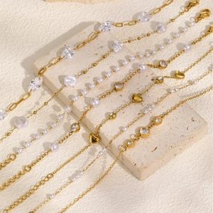 Elegant gold stainless steel bracelets with white pearls and zircon heart pendant charms