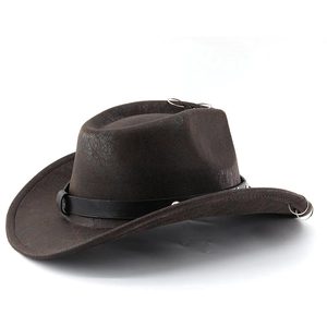 Detail of dark brown faux suede cowboy hat with vintage leather band and metal ring accents